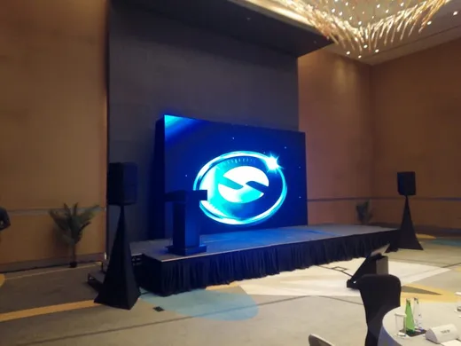 LED screen on a stage at a hotel ballroom event