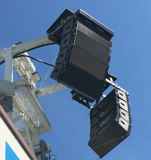 RCF line array speakers flown from a truss tower